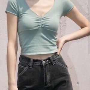 Light green winched shirt sleeve brandy top